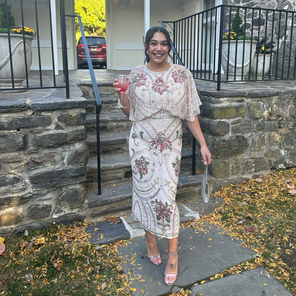 Elegant Beaded Dress with Floral Design